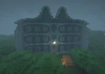Haunted Mansion built in Minecraft on a foggy, rainy night, surrounded by a hedge maze